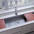 Stainless Steel Kitchen Sink With Wooden Covers Modern Faucet And White Cabinets