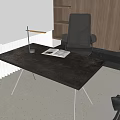Modern Desk with Black Tabletop Metal Legs Lamp Open Book Gray Chair and Wooden Bookshelf