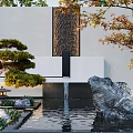 Traditional Japanese Garden Design With Pine Tree Water Feature And Rock Elements