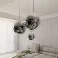 Modern Transparent Spherical Pendant Lights Hanging In Stylish Living Room With White Walls And Sofa