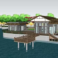 Scenic Waterfront Building Area With Green Trees Roads And Parked Cars