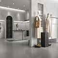 Modern Clothing Store Interior With Mannequins Displaying Dresses Clothes on Hangers and Display Table