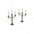 Elegant Brass Candelabra Pair With Three Candles Each And Ornate Bases