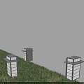 Four Square Shaped Outdoor Lights In Circular Arrangement On Grass Illuminated