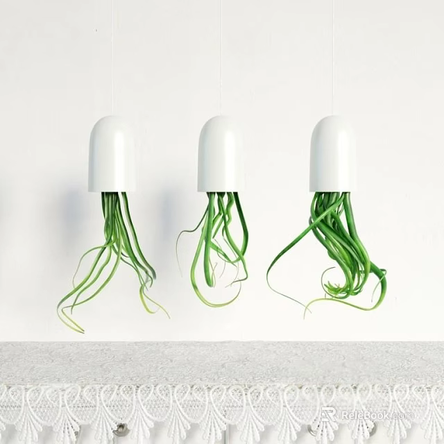 Stylish White Hanging Planters With Long Green Leaves Hung On White Wall Below Gray Countertop 3d model 