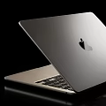 Sleek Modern Silver Apple Laptop Design With Shiny Logo And Keyboard