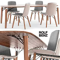 Modern Wooden Table And Upholstered Chair Set With Gray Beige Seats And Sturdy Wooden Legs