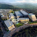 Modern Industrial Park Featuring Multiple Buildings Greenery Roads And Surrounding Mountains
