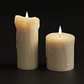 Two Lit Cream Colored Candles With Melting Wax On Black Background