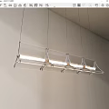 Modern Linear Chandelier With Metal Frame And Transparent Elements Hanging From Ceiling 3d model