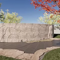 Natural Stone Garden Wall With Cracked Texture Green Trees Red Leaf Tree And Paved Ground