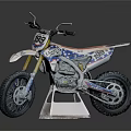 Yamaha Off Road Motorcycle With Red White Blue Graphics And Number 189 On Display Stand