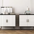 White Entryway Cabinet And Sideboard With Gold Metal Legs Black Countertop And Decorative Items