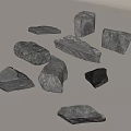Natural Gray Stones In Various Shapes And Sizes On Light Gray Background Surface