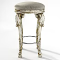 Vintage Silver Stool With Intricate Carved Legs And Padded Seat Design