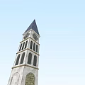 Beautiful White Clock Tower With Gray Spire And Classic Arched Windows