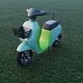 Green And Light Blue Electric Scooter Parked On Grass Field With Trees And Blue Sky