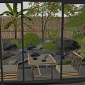 Japanese Courtyard Garden With Bamboo Fence Stepping Stones Pebbles And Lush Greenery