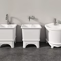 White Ceramic Washbasins With Faucets On Gray Floor Against Gray Wall