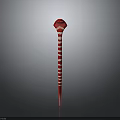 Red and White Striped Slender Snake With Diamond Shaped Head On Gray Background