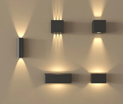 Modern Black Wall Sconces With Up And Down Lighting On Beige Wall 3d model
