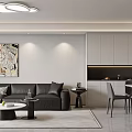 Modern Living Dining Room Interior With Black Sofa Round Coffee Table Artwork And Ceiling Light
