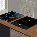 Modern Induction Cooktops On Wooden Table With Window And Decorative Art