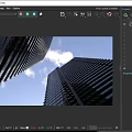 Airliner Flying Between Two Modern Skyscrapers In Sky With Clouds