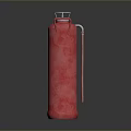 Red Textured Glass Bottle With Metallic Handle And Shiny Surface Design