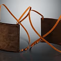 Two Brown Leather Items With Orange Crossed Straps And Rectangular Design 3d model