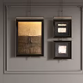 Framed Abstract Paintings On Gray Wall With Textured Surfaces And Neutral Tones