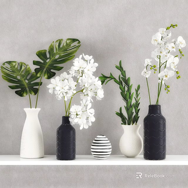 Decorative Vases With White Orchids And Green Monstera Leaves On Shelf Against Neutral Wall 3d model 