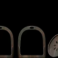 Brown Wooden Stirrups Horse Riding Equipment Three Pieces On Floral Yellow Surface