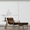 Stylish Brown Lounge Chair With Ottoman Side Table And Vase Against Vertical Blinds
