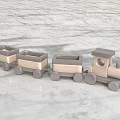 Wooden Toy Train Set With Locomotive And Three Carriages On Marble Surface