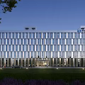 Aerial Planning of Modern Office Building With Glass Curtain Wall at Night