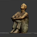 Man Sitting Bronze Statue With Arms Crossed Looking Up On Square Stone Slab