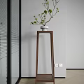 Tall Wooden Plant Stand With White Ceramic Pot And Green Plants In Modern Interior