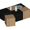 Modular Coffee Table In Black And Light Wood With Glass Cups And Magazines