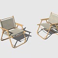 Two Foldable Outdoor Chairs With Golden Frame And Textile Seat Design