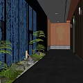 Hotel Corridor With Blue Calligraphy Walls Green Plants Stone Flooring And Warm Lighting