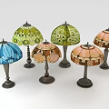 Colorful Stained Glass Table Lamps With Metal Bases And Floral Patterns