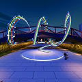 Illuminated Curved Pedestrian Bridge With Colorful Lights In Nighttime Urban Plaza