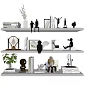 Elegant Decorative Ornament Combination On White Shelves With Books Statues Clock Plant And Hourglass