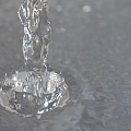 Water Fountain Design Featuring Flowing Water And Vertical Jet Spray Structures