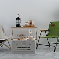Outdoor Table with Folding Storage Box and Chairs holding Lantern Jar and Candle