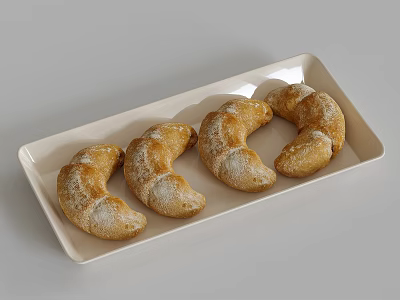 Four Fresh Croissants on a White Rectangular Plate Dusted with Powdered Sugar 3d model