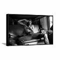 Shirtless Male Portrait Painting on Sofa Holding Camera in Car Interior Black White Style