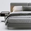 Modern Double Bed with Gray Headboard White Gray Pillows and Black Throw Blanket