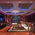 Modern KTV Interior Design With Purple Lighting Large Screen TV And Comfortable Sofas 3d model